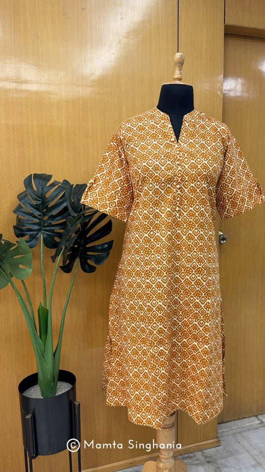 Yellow Printed Cotton A-line Kurti